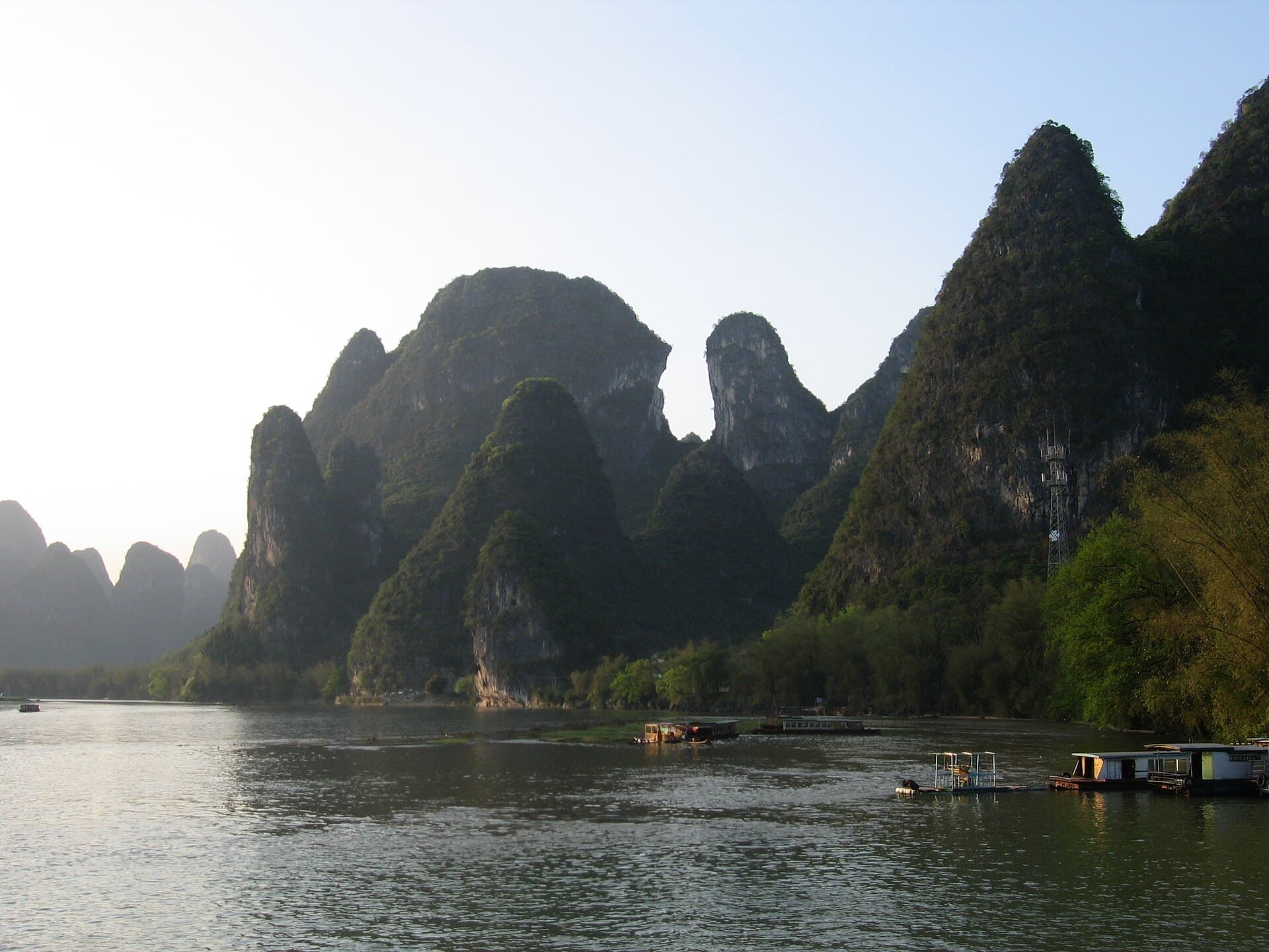 Rounded karst peaks reflected in the Li River at Xingping, the view printed on the 20-yuan note