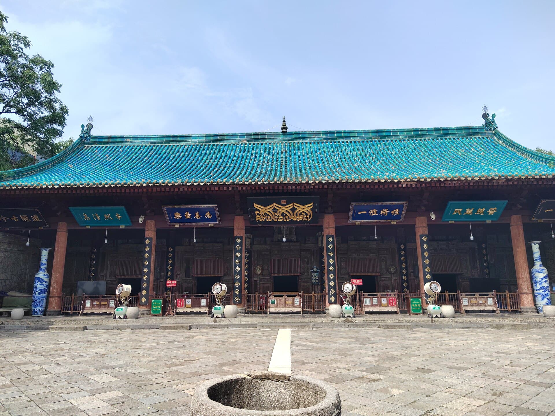 The green-tiled prayer hall of the Great Mosque of Xi'an, built like a Chinese temple, with a courtyard in front