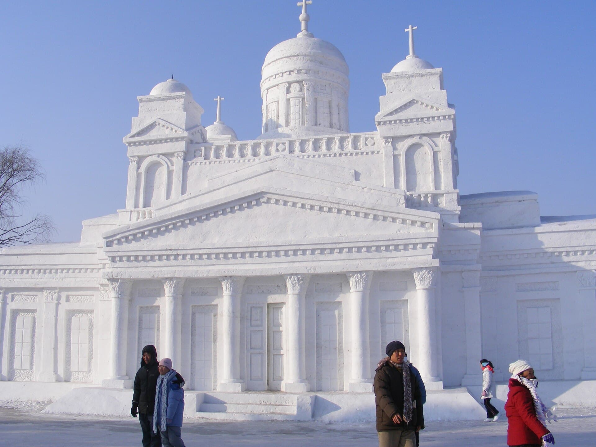 A church-shaped building carved entirely from snow at the Sun Island snow sculpture exhibition in Harbin
